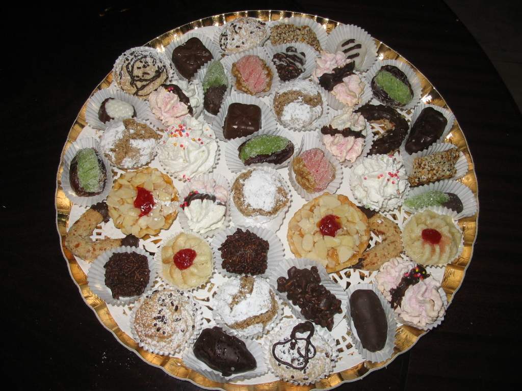 Selection of Moroccan cookies, almonds, peanuts, dates, chocolate coated, very tasty coconut